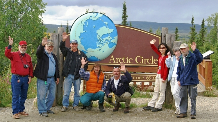 Things to do near Fairbanks - Image of people at the Arctic Circle Sign